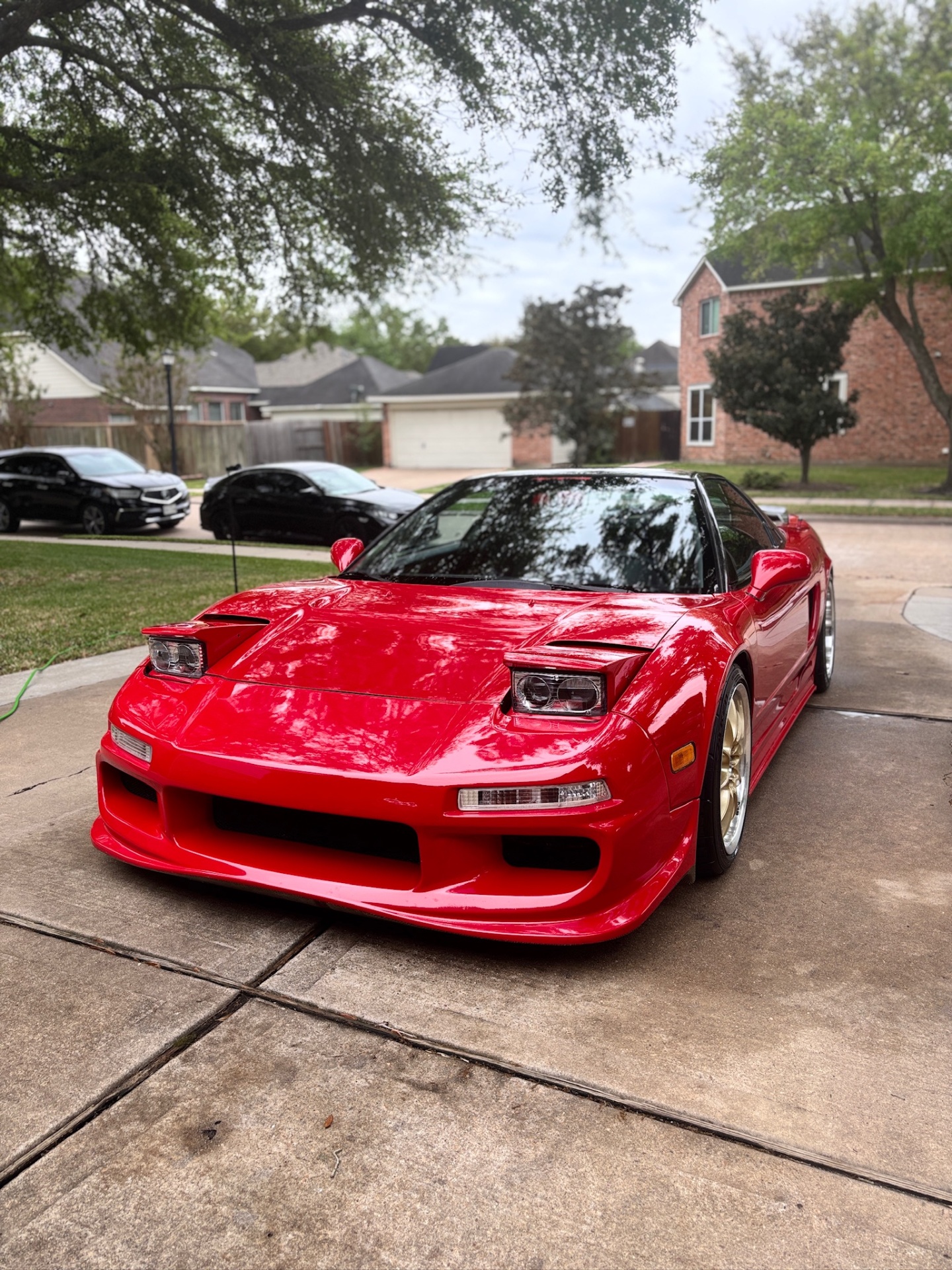 Red Acura NSX with a deep glossy exterior finish